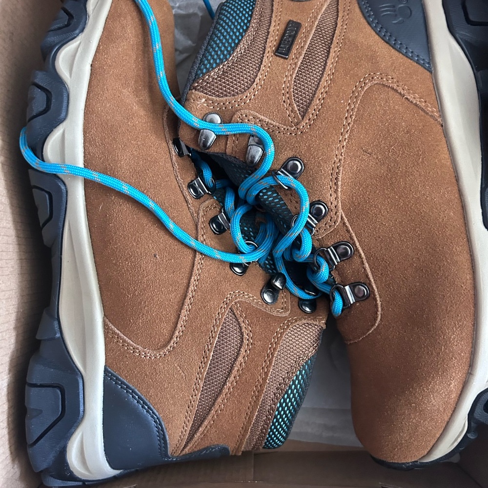 BearPaw Tan and Black Women’s waterproof boots